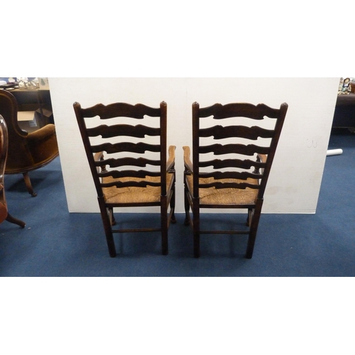 337 - Two ladder-back carver chairs and two similar side chairs.  (4)