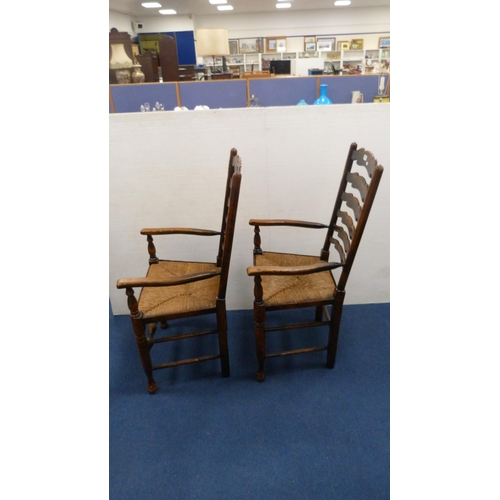 337 - Two ladder-back carver chairs and two similar side chairs.  (4)