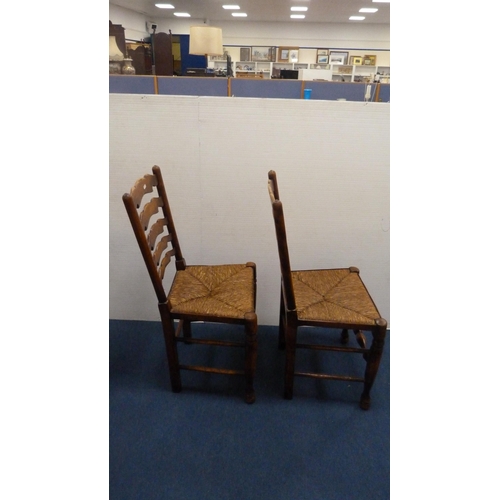 337 - Two ladder-back carver chairs and two similar side chairs.  (4)