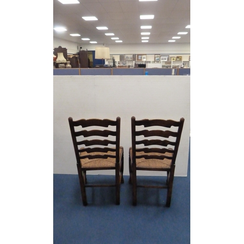 337 - Two ladder-back carver chairs and two similar side chairs.  (4)