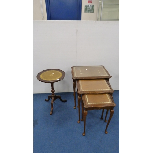 338 - Nest of three tables with brown skivers and glass tops, on pad feet, and a wine table on tripod supp... 