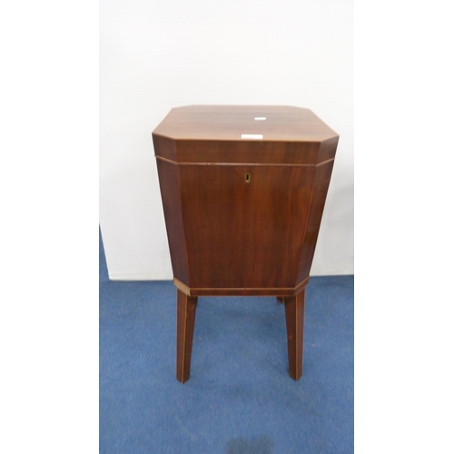 339 - Mahogany wine cooler with brass handles, on tapered supports.