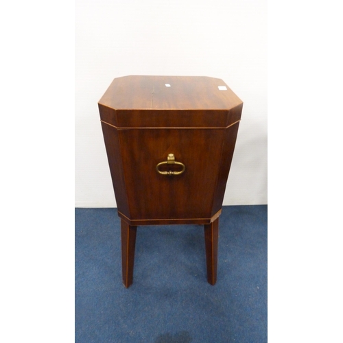 339 - Mahogany wine cooler with brass handles, on tapered supports.