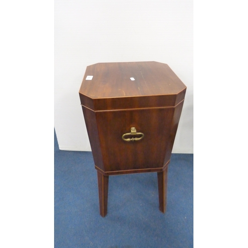 339 - Mahogany wine cooler with brass handles, on tapered supports.