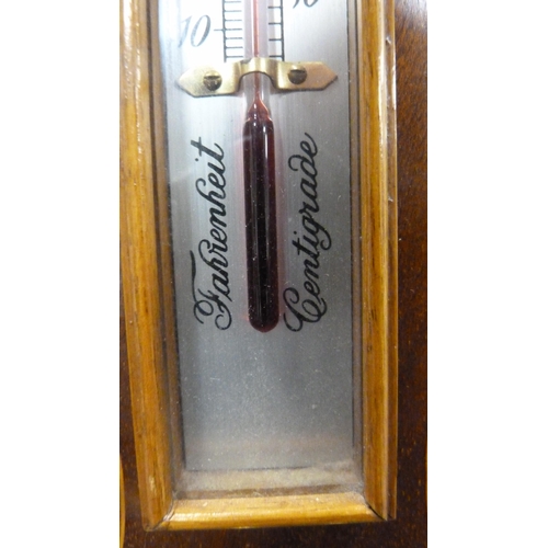 340 - Shooting stick and a banjo barometer.  (2)