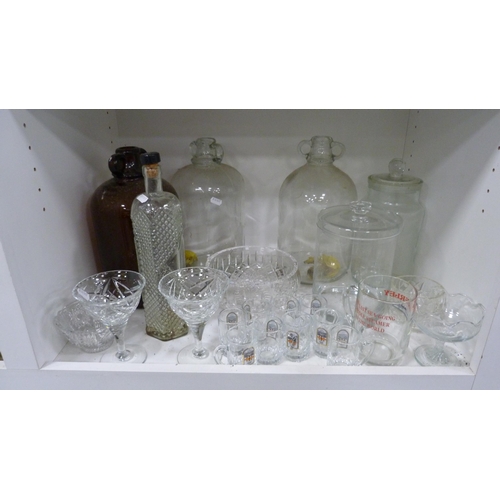 60 - Glassware to include sporting lemonade set, flower vases, bowls, drinking glasses, storage jars, fla... 