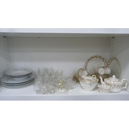 63 - Edwardian floral decorated part tea set and various glassware etc (one shelf).