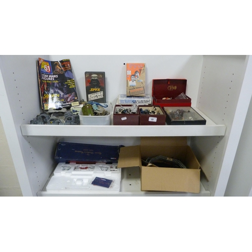 69 - Collection of various toys to include figures, magazine, model railway accessories, VHS tapes, Corgi... 