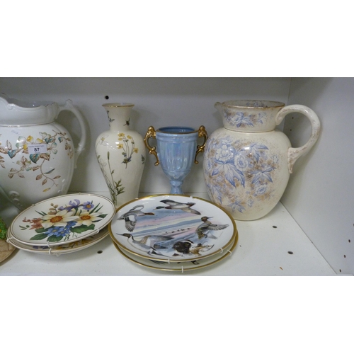 87 - Two large pottery ewers, Sylvac relief-decorated jug, pair of Coalport McPhail's sporting birds plat... 