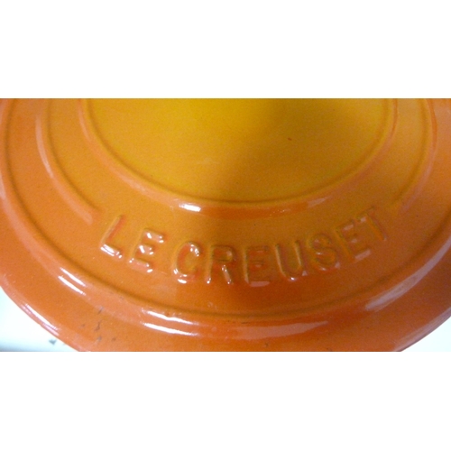 93 - Four Le Creuset pans, various storage jars etc (one shelf).