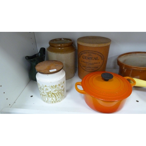 93 - Four Le Creuset pans, various storage jars etc (one shelf).