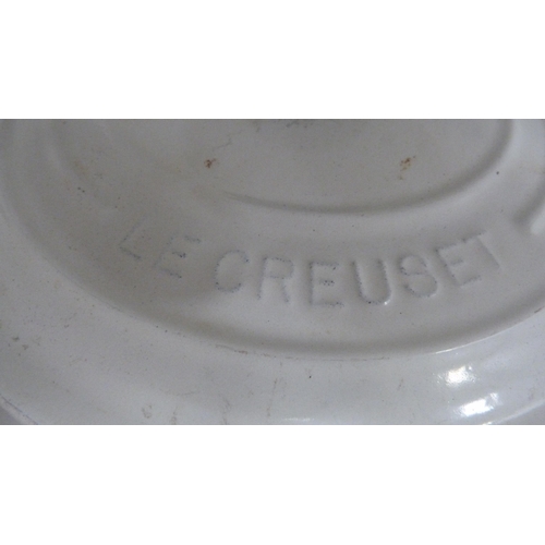 93 - Four Le Creuset pans, various storage jars etc (one shelf).