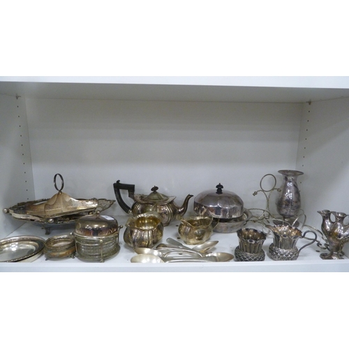 96 - Silver plated wares to include EP thistle-shaped sugar and cream, silver plated three-piece tea serv... 