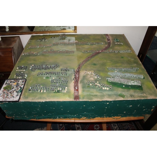 224A - Large diorama of the Battle of Minden, set with painted metal figures, 147cm x 127cm.