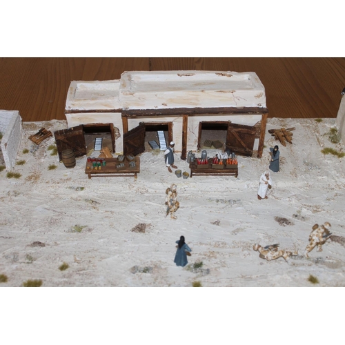 224B - Diorama of an Iraqi village scene, 122cm x 44cm.