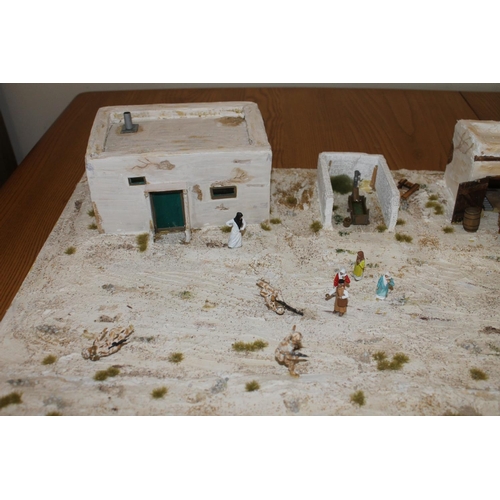 224B - Diorama of an Iraqi village scene, 122cm x 44cm.