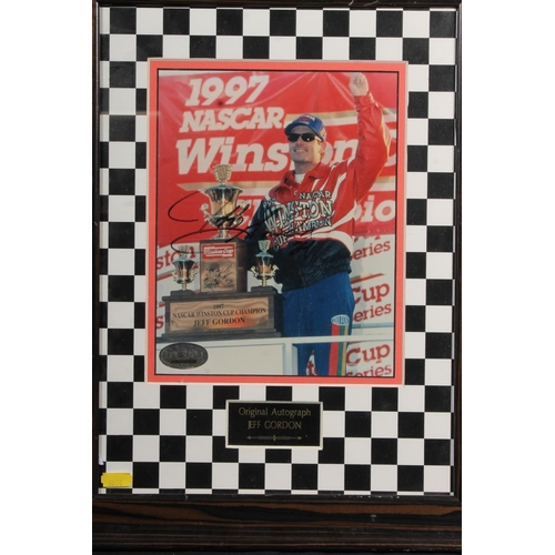 508Z - Motor Racing interest, a Dale Earnhardt photograph mounted on board with piece of rubber and plaque,... 