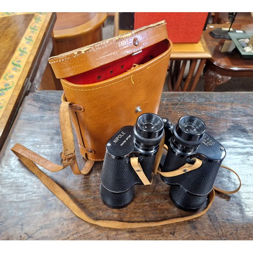 354 - Nipole coated optics 10x50 field binoculars in leather case