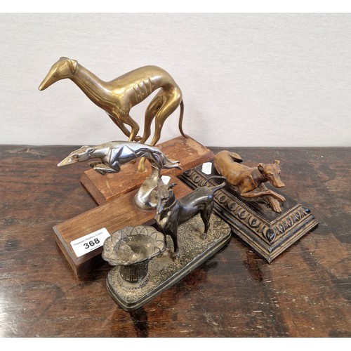 368 - Four Greyhound figures in brass, bronzed, etc  including car mascot leaping greyhound(4)