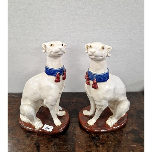 369 - Pair of white Staffordshire style porcelain dogs, 35cm h