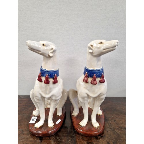 369 - Pair of white Staffordshire style porcelain dogs, 35cm h