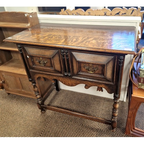 572 - Oak hall table with two fitted drawers