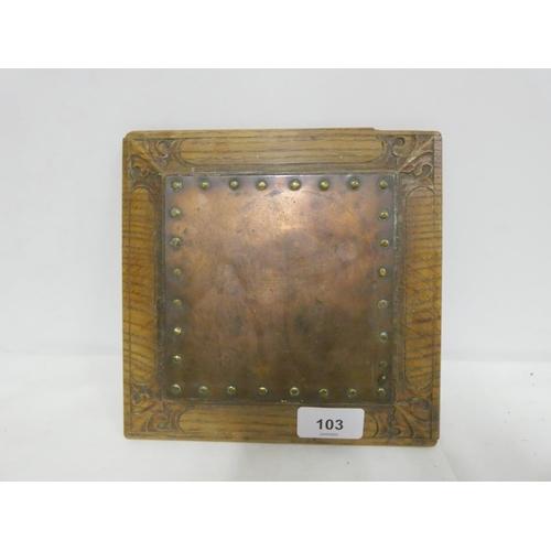 103 - Arts and Crafts style carved oak and copper trivet in the manner of Arthur Simpson of Kendal.20cm sq... 