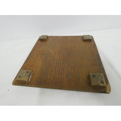 103 - Arts and Crafts style carved oak and copper trivet in the manner of Arthur Simpson of Kendal.20cm sq... 