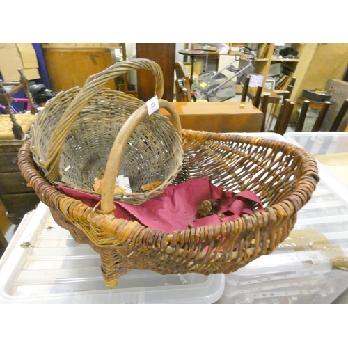 124 - Two vintage wicker baskets.