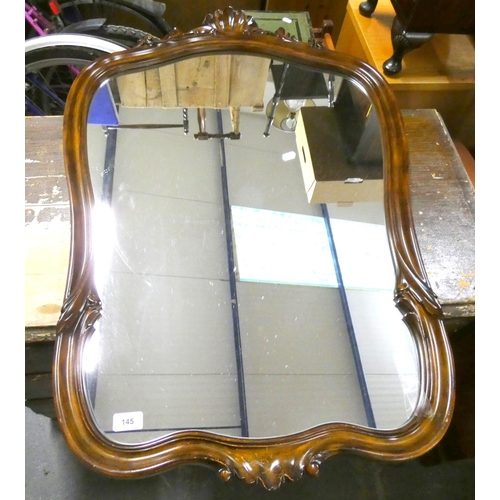 145 - Large ornate mahogany wall mirror.