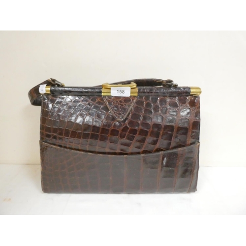 158 - Antique aligator skin handbag by Vassar.