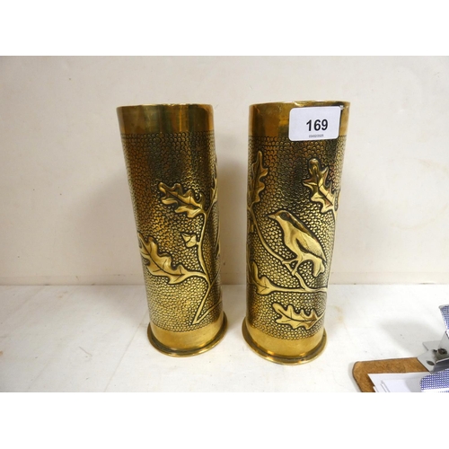 169 - Pair of brass trench art Christmas scene shells, both German 1916-1917 23cm.