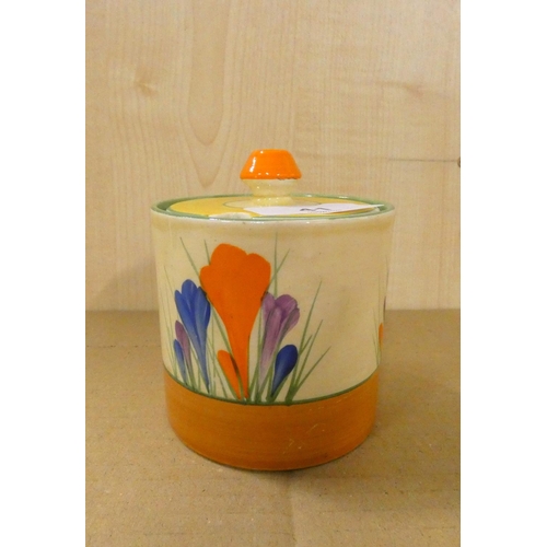 41 - Clarice Cliff bizarre crocus pattern preserve pot and cover, 10cm.