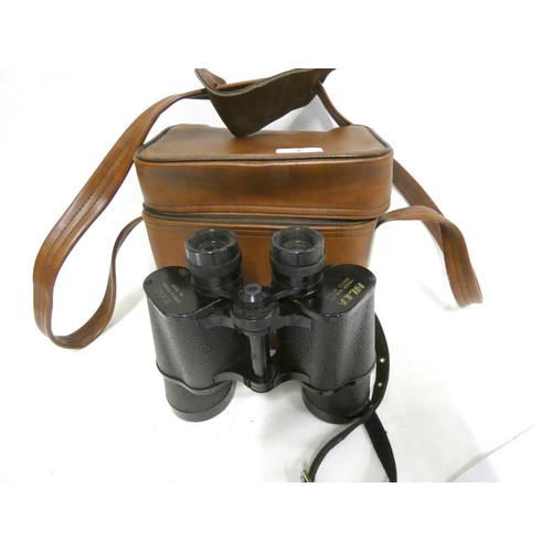 7 - Pair of cased Hilka 10 x 50 binoculars.