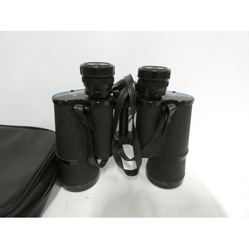 8 - Pair of Tasco 16 x 50 binoculars.