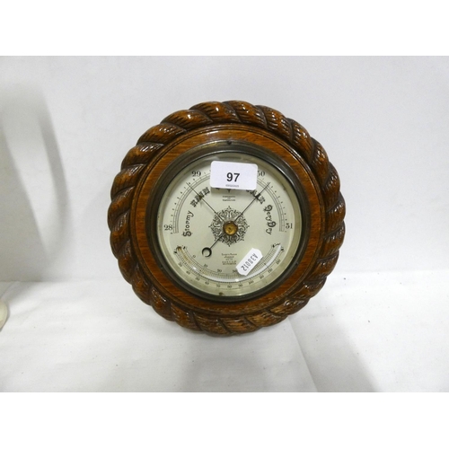 97 - Shorts and Mason London oak wheel barometer 49cm diameter.