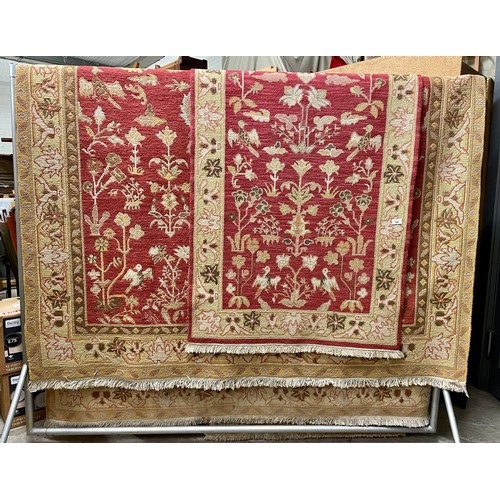 726 - Two matching patterned rugs