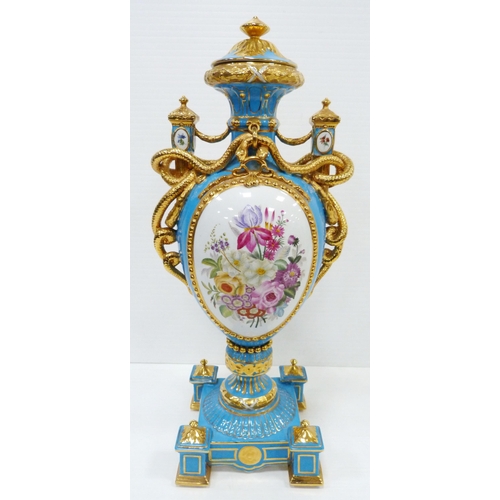 256 - Pair of large porcelain vases and covers decorated with cartouches of flowers and gilded coiled snak... 