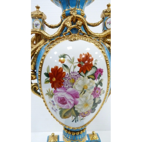 256 - Pair of large porcelain vases and covers decorated with cartouches of flowers and gilded coiled snak... 