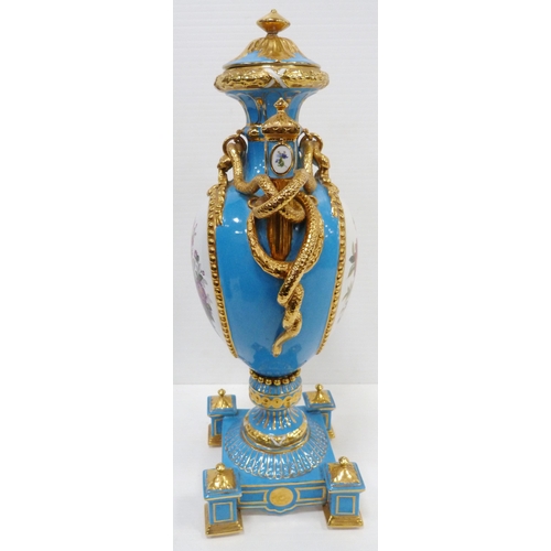 256 - Pair of large porcelain vases and covers decorated with cartouches of flowers and gilded coiled snak... 