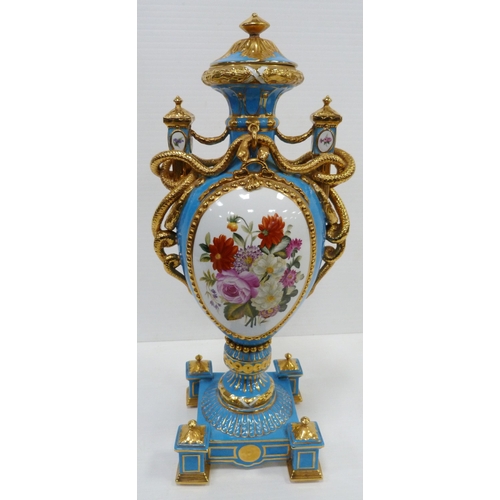256 - Pair of large porcelain vases and covers decorated with cartouches of flowers and gilded coiled snak... 