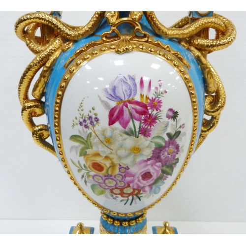 256 - Pair of large porcelain vases and covers decorated with cartouches of flowers and gilded coiled snak... 