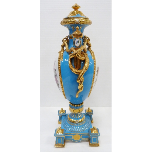 256 - Pair of large porcelain vases and covers decorated with cartouches of flowers and gilded coiled snak... 