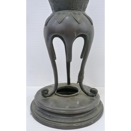 308 - Pair of Japanese cast metal vases of baluster form, Meiji 1868 - 1912, on tripod table supports and ... 