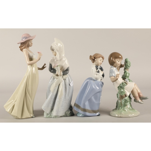 23 - Four Nao figurines (4)