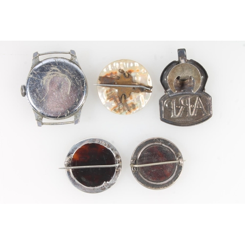 379 - Two silver and tortoiseshell sweetheart brooches, another, an ARP silver badge and a military style ... 