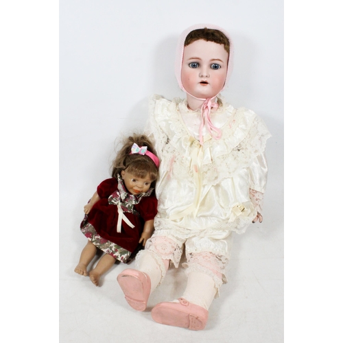 23 - Simon & Halbig #80 doll with Cinderella shoes, 70cm high, and another doll.