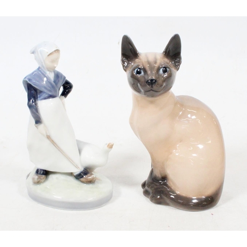 36 - Royal Copenhagen figurine of a girl with goose and a Royal Copenhagen Siamese cat model.