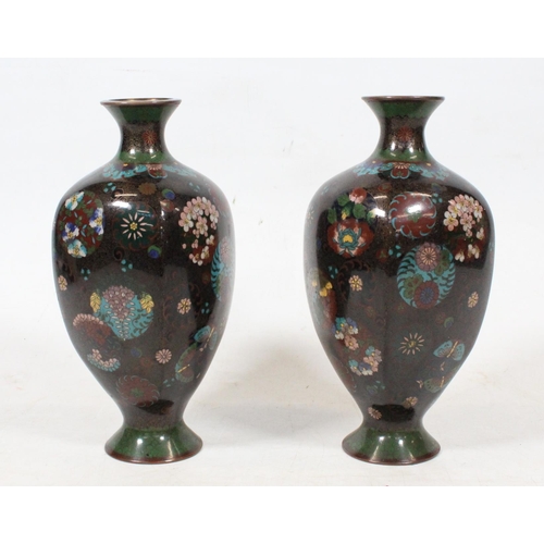 37 - Pair of Japanese cloisonné vases decorated with flowers, 24cm high.