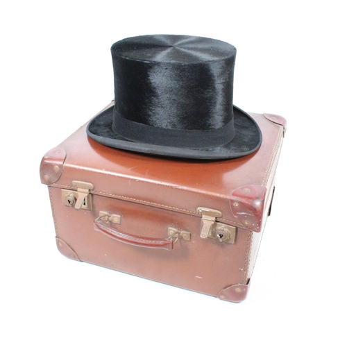 39 - Forsyth Brothers top hat with original leather case.